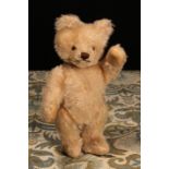A 1950's Steiff (Germany) blonde mohair jointed miniature teddy bear, brown and black plastic