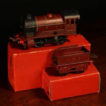 A Hornby O Gauge tinplate and clockwork No.501 0-4-0 tank locomotive (reversing) and four wheel