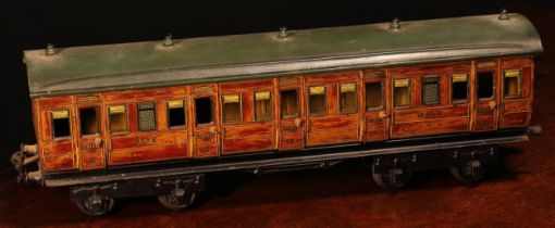 A Gebruder Marklin (Germany) Gauge 1 tinplate first/third passenger coach, G.N.R., No.2875, 44cm