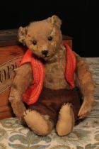 An early 20th century jointed golden mohair teddy bear, attributed to Steiff (Germany), black boot