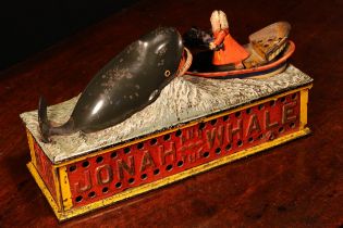 Americana - a late 19th century painted cast iron mechanical money box or bank, Jonah and the Whale,