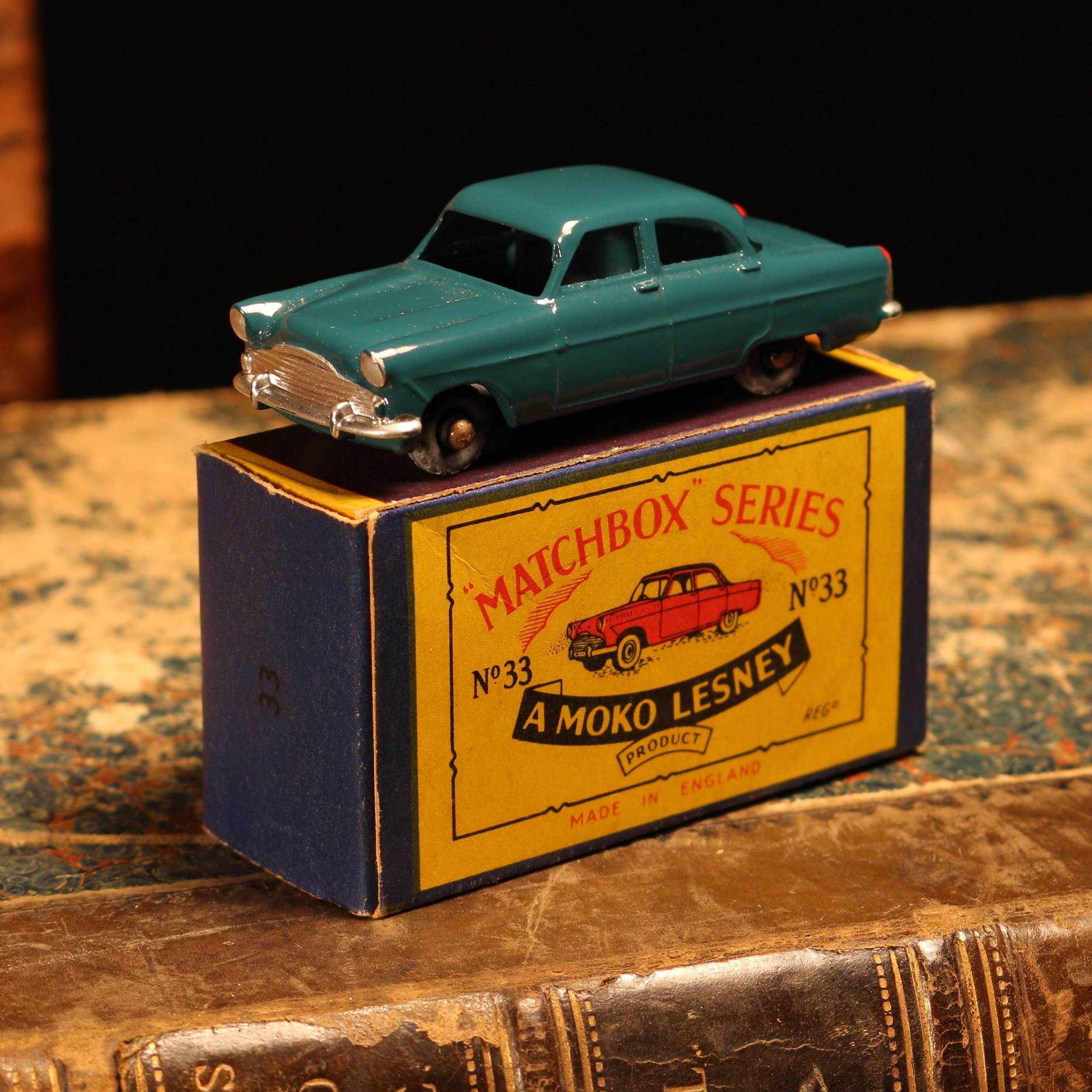 Matchbox '1-75' series diecast model 33a Ford Zodiac, dark green body, unpainted metal wheels, boxed