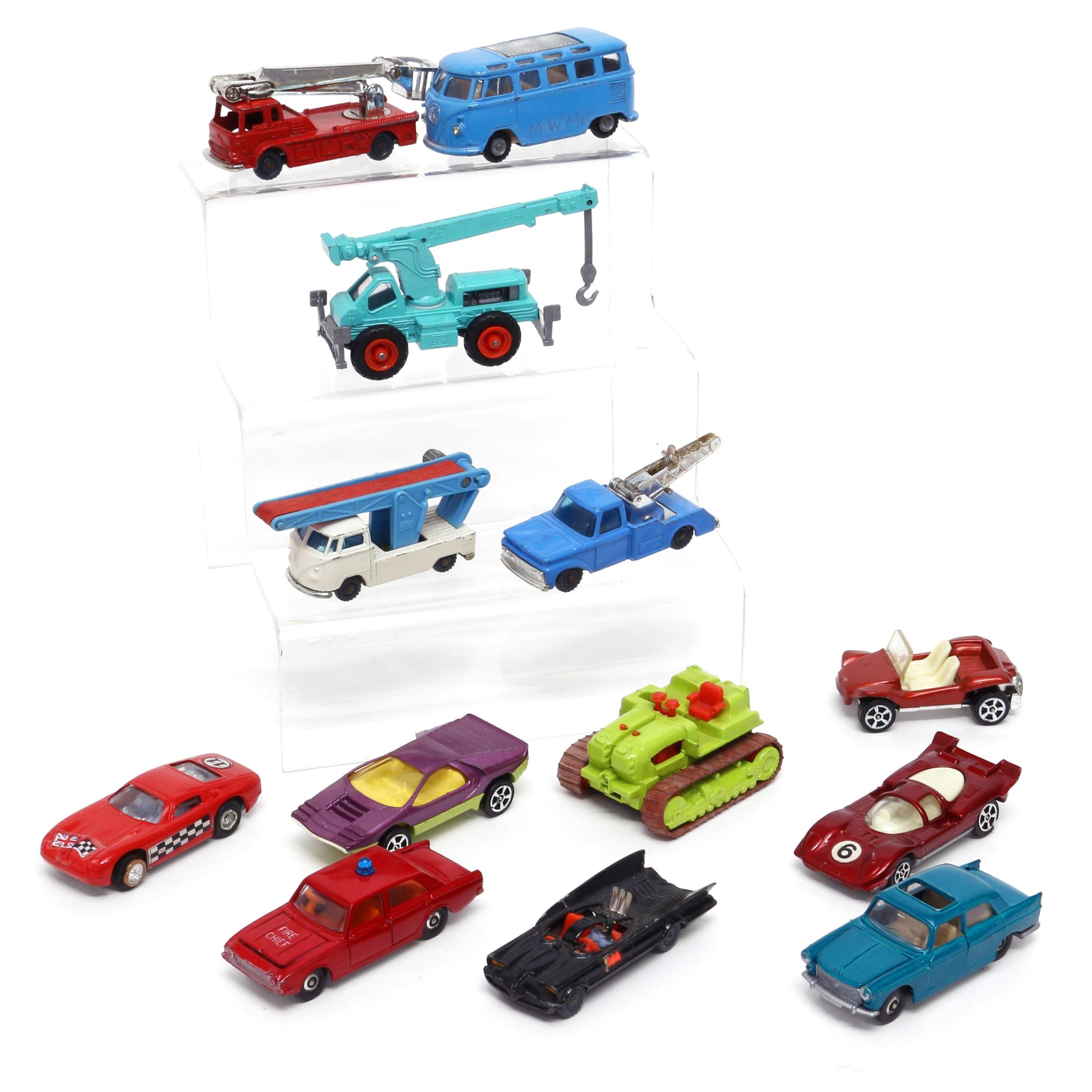A collection of unboxed diecast models, comprising a Husky Volkswagen pick-up, white body with