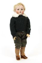 A German bisque head and ball jointed painted composition character doll, the bisque head with