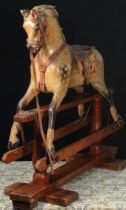 A late 19th century English wooden rocking Horse, of small proportions, attributed to Frederick