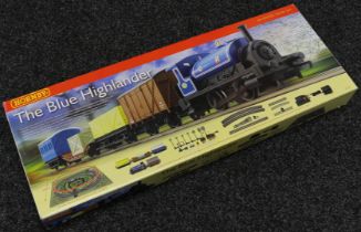 A Hornby OO Gauge R.1101 The Blue Highlander train set, comprising Caledonian 0-4-0ST locomotive,