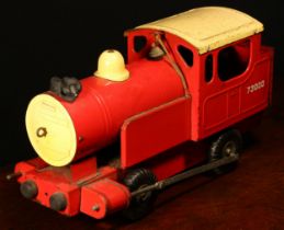 A 1950's Tri-ang 'Puff-Puff' pressed steel floor locomotive, red body with cream roof, No.73000