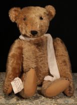 A large early 20th century jointed golden mohair teddy bear, attributed to Steiff (Germany) and