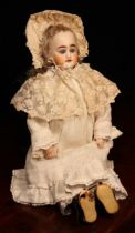 A bisque shoulder head doll, the bisque shoulder head with weighted sleeping blue glass eyes,