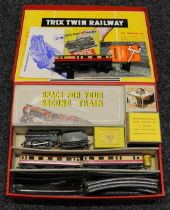 A Trix Twin Railway (TTR) 1/334 three rail passenger train set, comprising 0-4-0 tank locomotive and