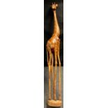 A large impressive African carved wooden figure, as a Giraffe standing, approx 272cm high