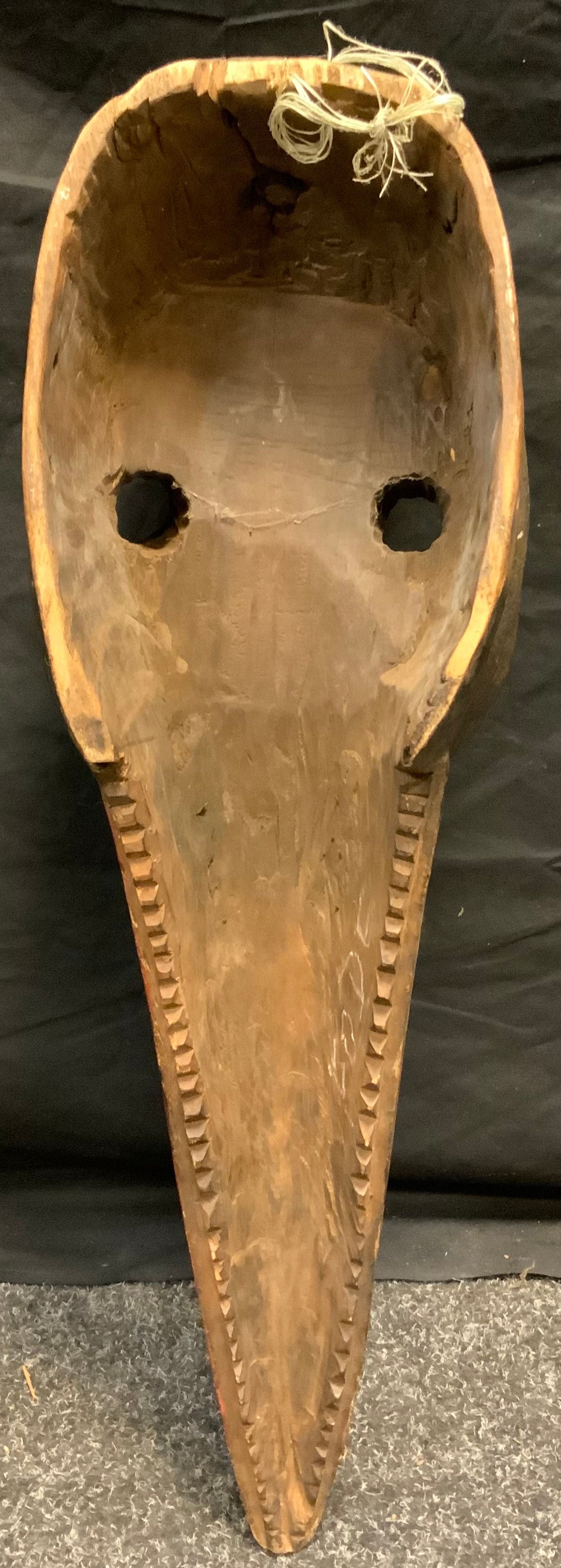 An African tribal zoomorphic dan bird mask, hole eyelets, elongated beak, nailed details, picked out - Image 2 of 4