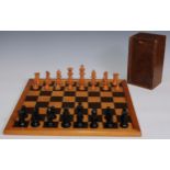 A boxwood and ebonised Staunton pattern chess set, weighted bases, the Kings 9cm high; a parquetry