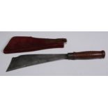 A South East Asian knife or machete, 24cm blade, wooden handle with ring-turned grip, 38cm long,