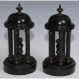 A pair of 19th century black marble and dark patinated parcel-gilt metal rotunda library porticos,