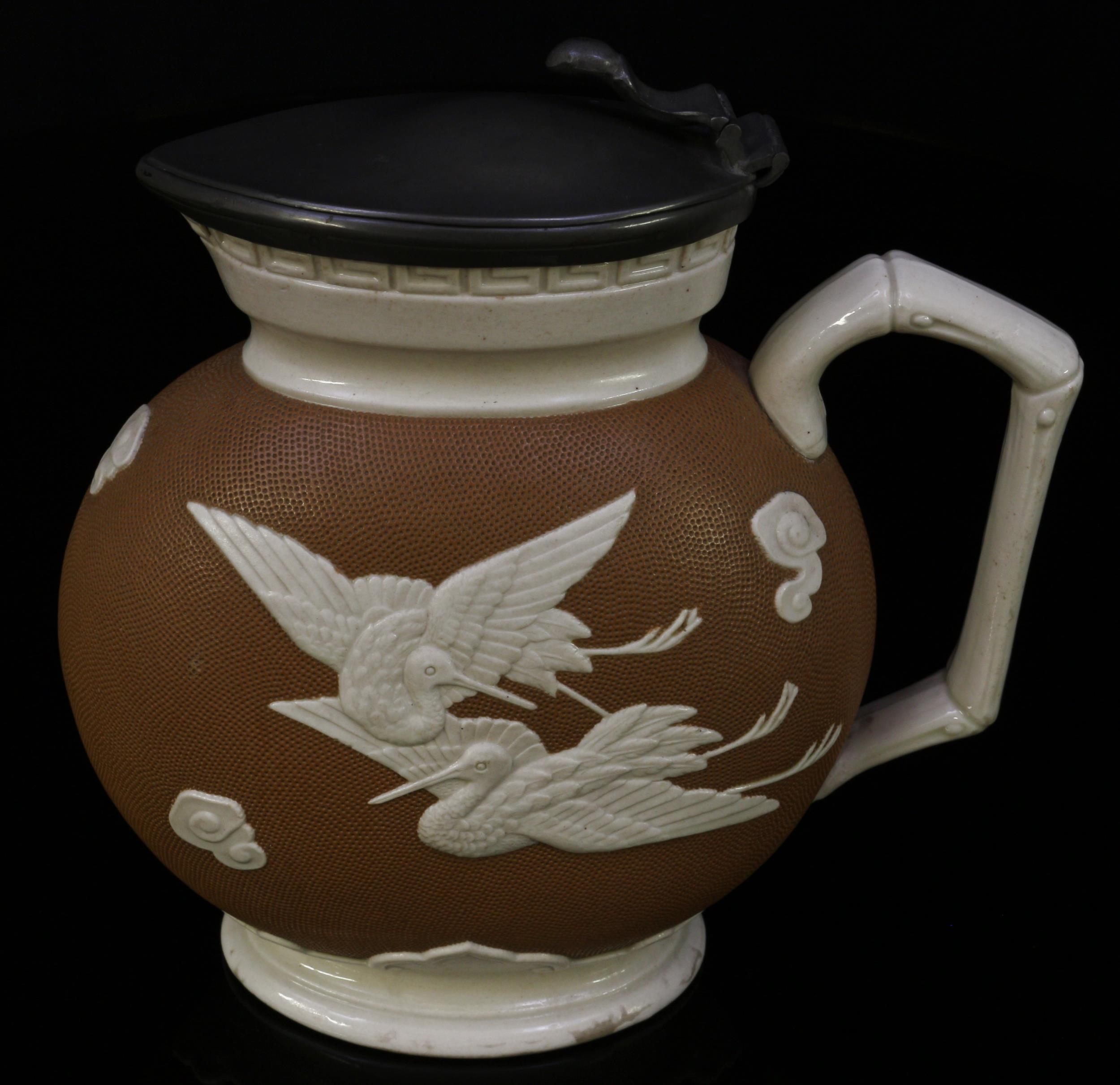 A Brownfield & Son Aesthetic Movement jug, designed by Dr Christopher Dresser (1834 - 1904), moulded