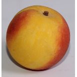 A carved alabaster peach, naturalistically painted, 7cm high, 19th/early 20th century