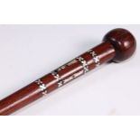 Tribal Art - a Polynesian hardwood staff, globular pommel above inlaid geometric bands of mother