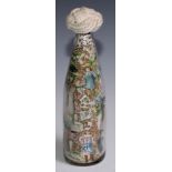 A 19th century decoupage valentine bottle doorstop, by Alex Spraggon, 25 Lampeter Aquare, Fulham,