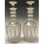 A pair of 19th century glass ovoid mallet shaped decanters, hobnail-cut in bands and panels, three