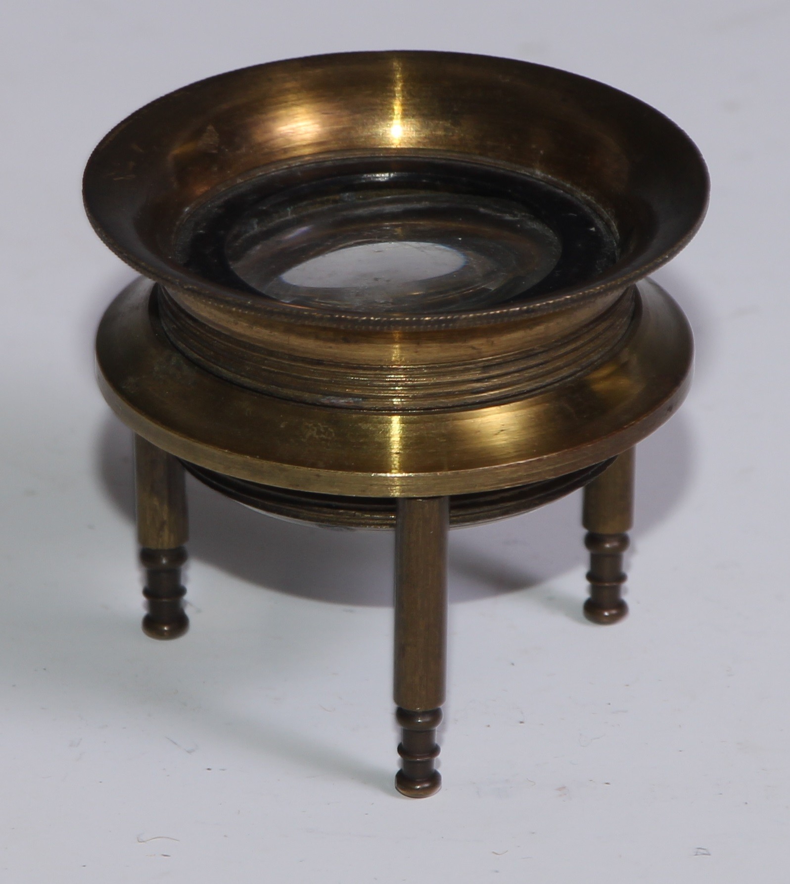Cartography - an early 20th century lacquered brass tripod map reading lens, 4.5cm diam - Image 2 of 2