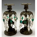 A pair of post-Regency candle lustres, campana sconces, chased with borders of flower heads and