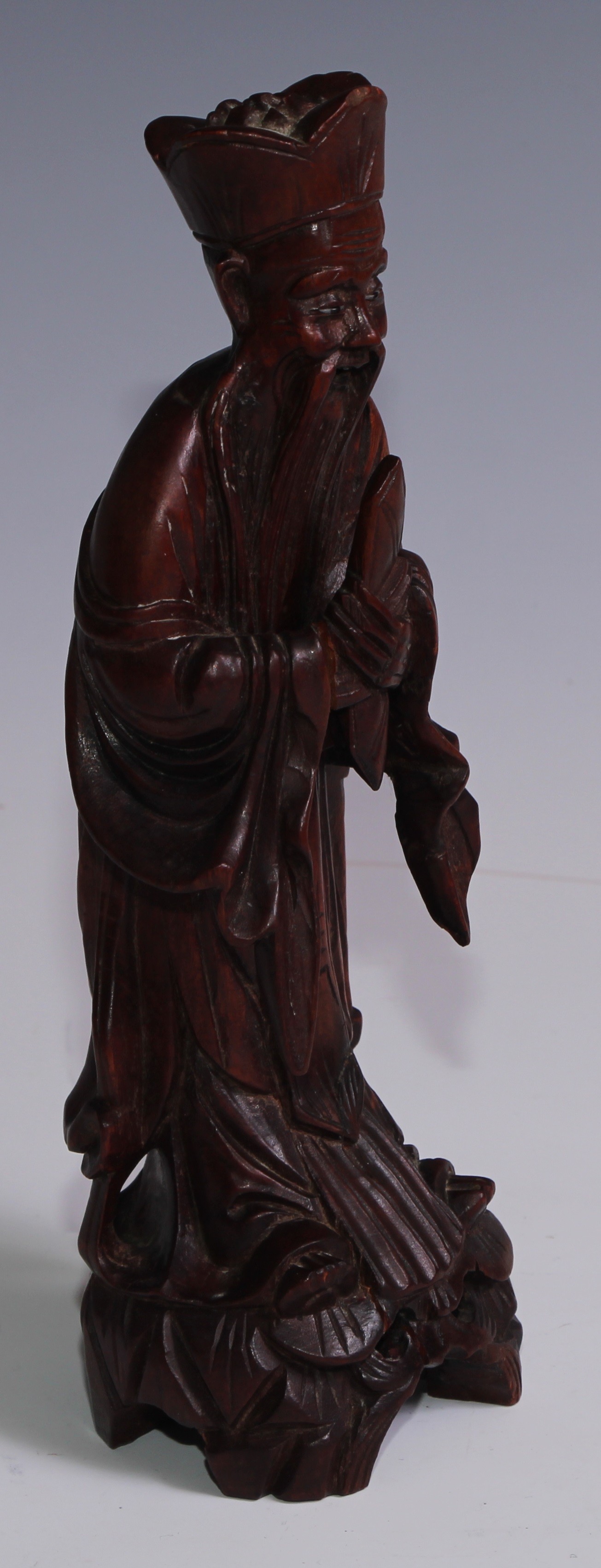 A Chinese soapstone seal, 9.5cm high; a Chinese carved hardwood figure, of an immortal, 23.5cm high; - Image 3 of 9