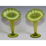 A pair of 19th century uranium vaseline glass Jack-in-the-pulpit vases, 19cm high