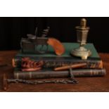 A Dunhill tinder pistol table cigarette lighter, pat.592139, 14.5cm long; a brass novelty table