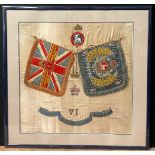 A World War I military silk picture, The Royal Warwickshire Regiment, with crossed banners, insignia