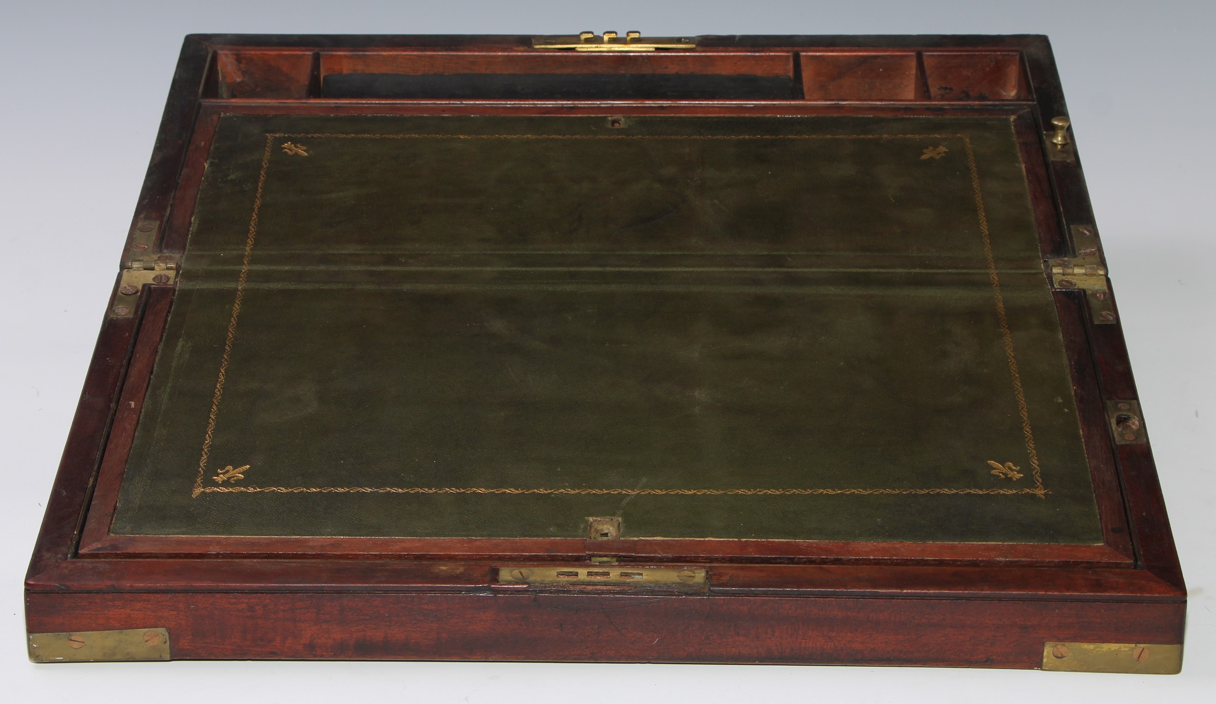 A George III brass mounted mahogany rectangular writing box, hinged cover enclosing a fitted