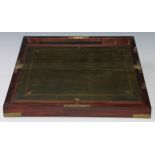 A George III brass mounted mahogany rectangular writing box, hinged cover enclosing a fitted