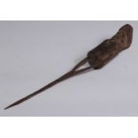 Tribal Art - an African figural house marker, bust-length with stylised features, iron spike, 41cm