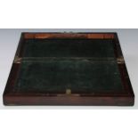 A George IV brass bound rosewood rectangular writing box, hinged cover enclosing a fitted