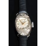 An early 20th century Altair 18ct white gold cocktail watch, the case set with ten diamond chips,