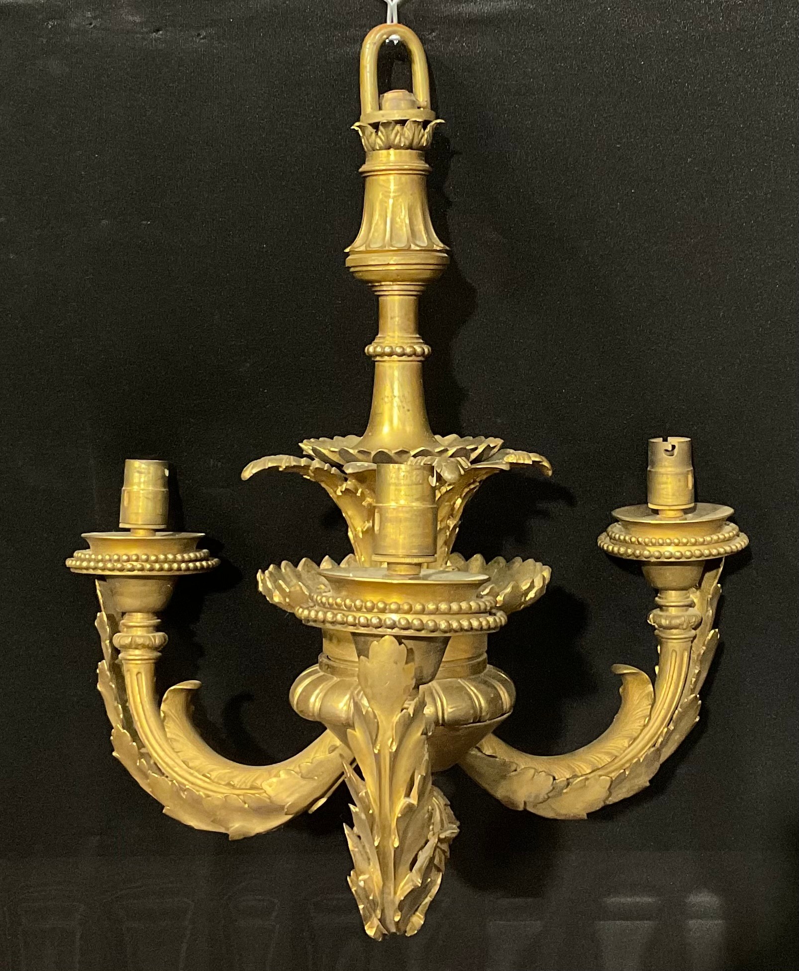 An early 20th century ormolu three branch electrolier, cast with acanthus, beaded borders, 37cm wide - Image 3 of 4