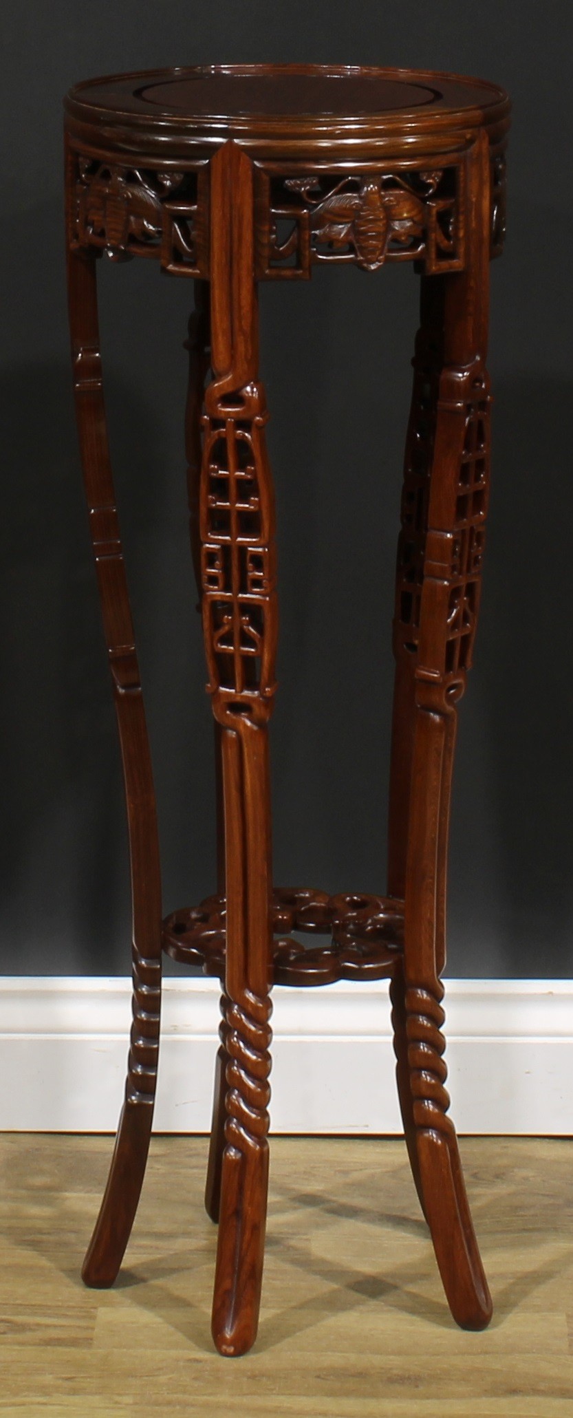 A Chinese hardwood jardiniere stand, circular top, shaped apron pierced and carved with moths, - Image 5 of 6