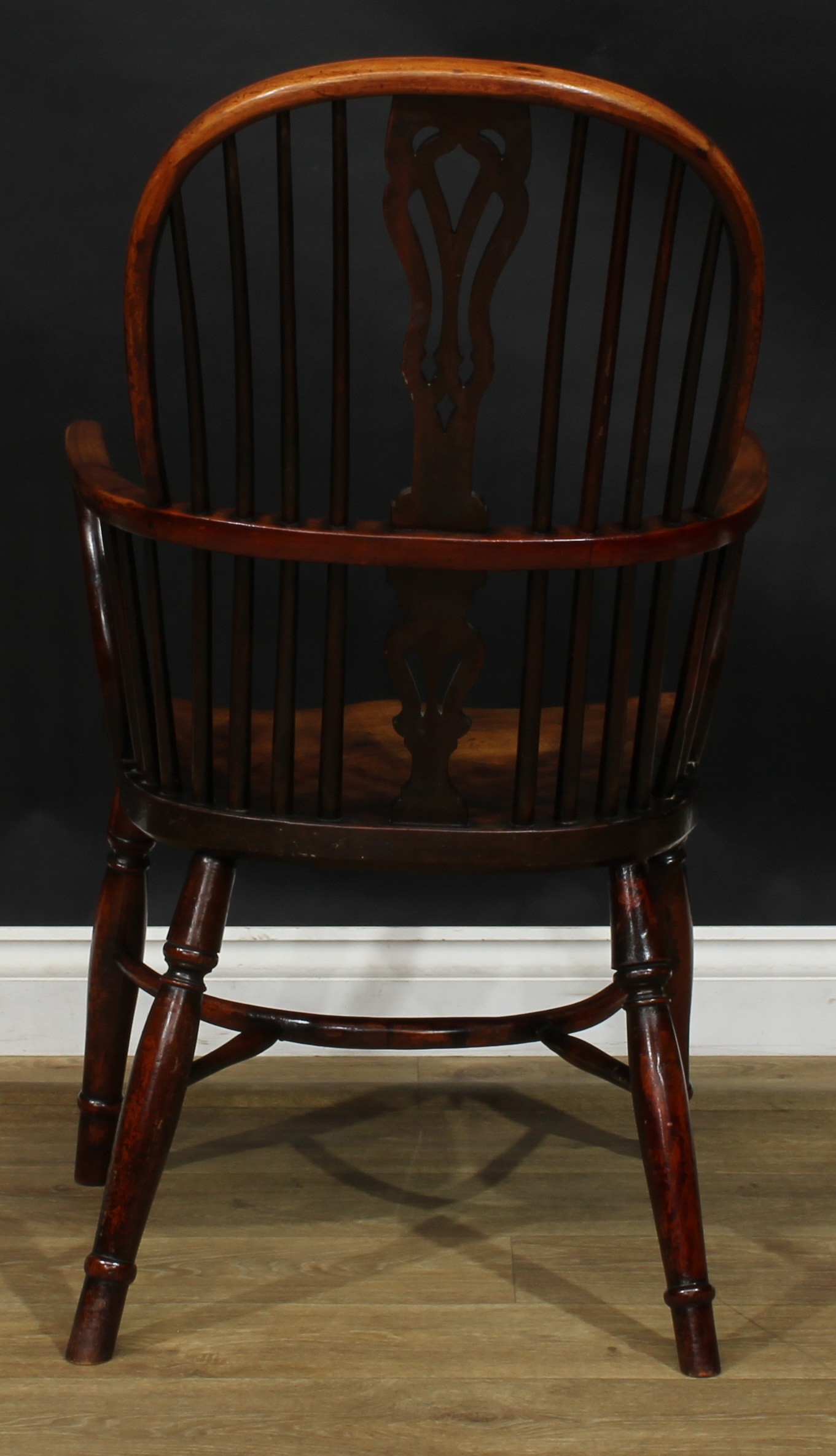 A 19th century yew and beech Windsor elbow chair, hoop back, shaped and pierced splat, one-piece - Image 4 of 4