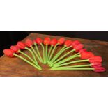 A collection of Art Nouveau blown glass tulips, naturalistically modelled red flowers with green