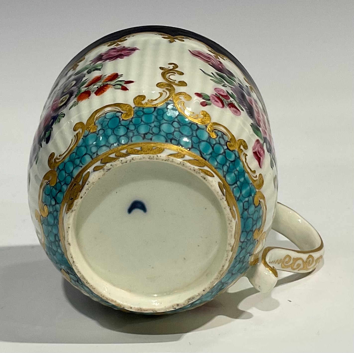 A Worcester fluted teacup and saucer, circular cartouches painted with lakeside scenes, edged with a - Image 8 of 11