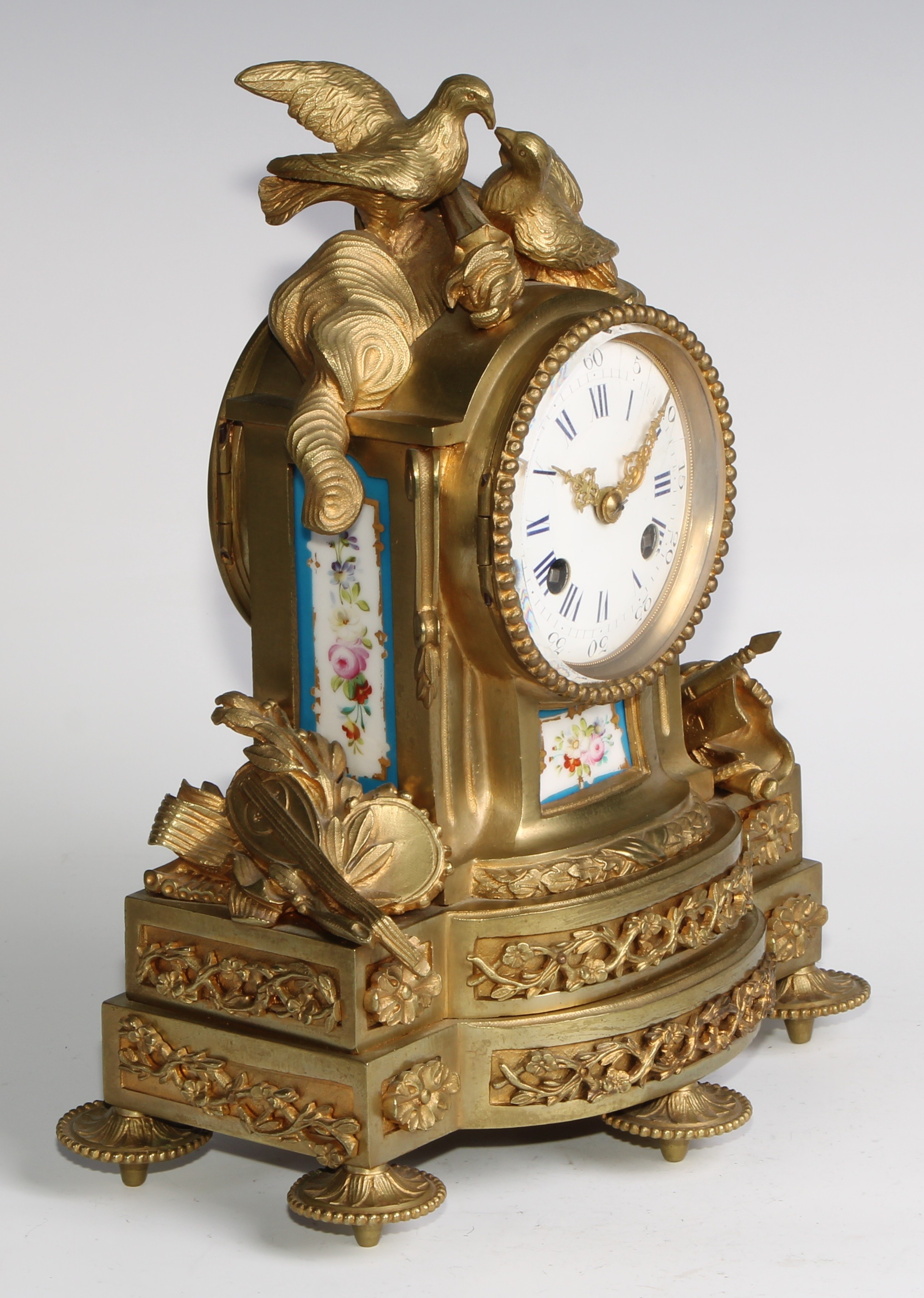 A French gilt brass mantel clock, crested with a pair of lovebirds and flaming torch, the white - Image 3 of 6
