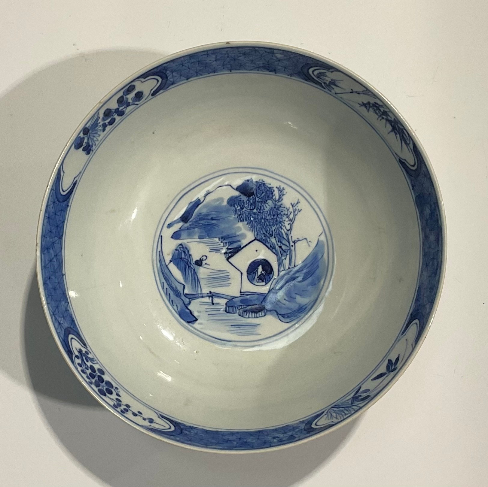 A Chinese circular bowl, playing in tones of underglaze blue with figures in a monumental landscape, - Image 6 of 8