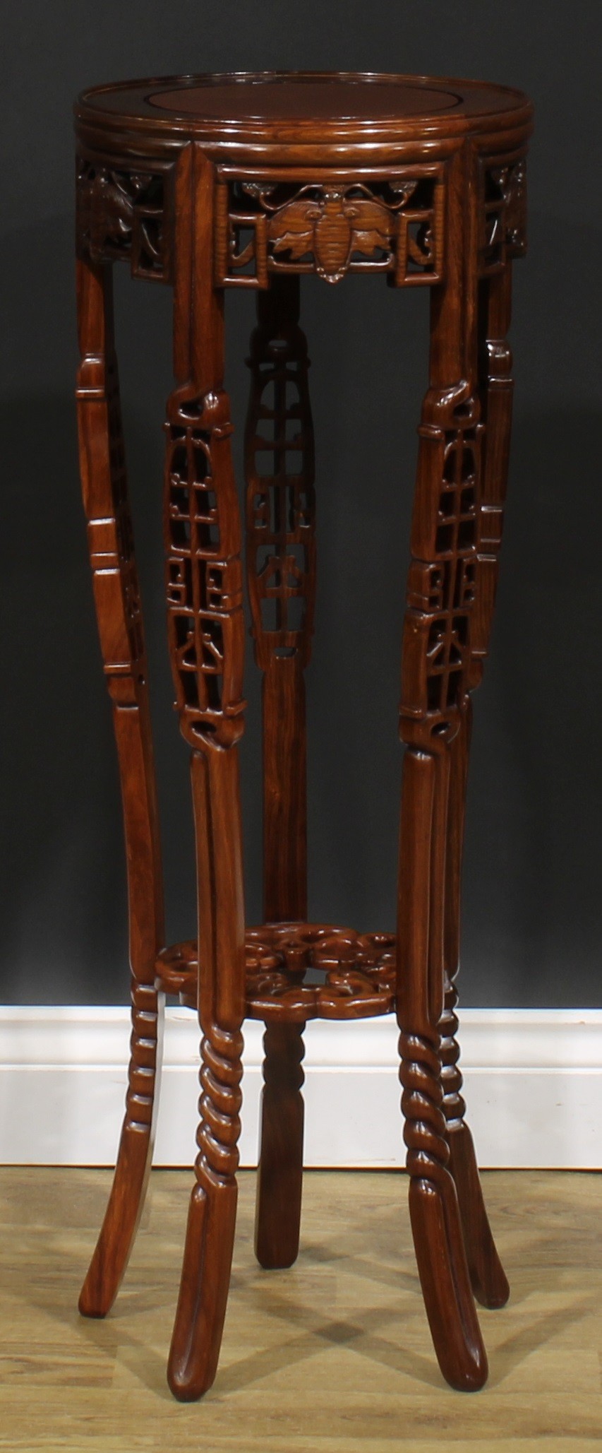 A Chinese hardwood jardiniere stand, circular top, shaped apron pierced and carved with moths, - Image 4 of 6