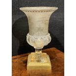A 19th century French frosted and clear glass half spirally lobed campana shaped vase, decorated