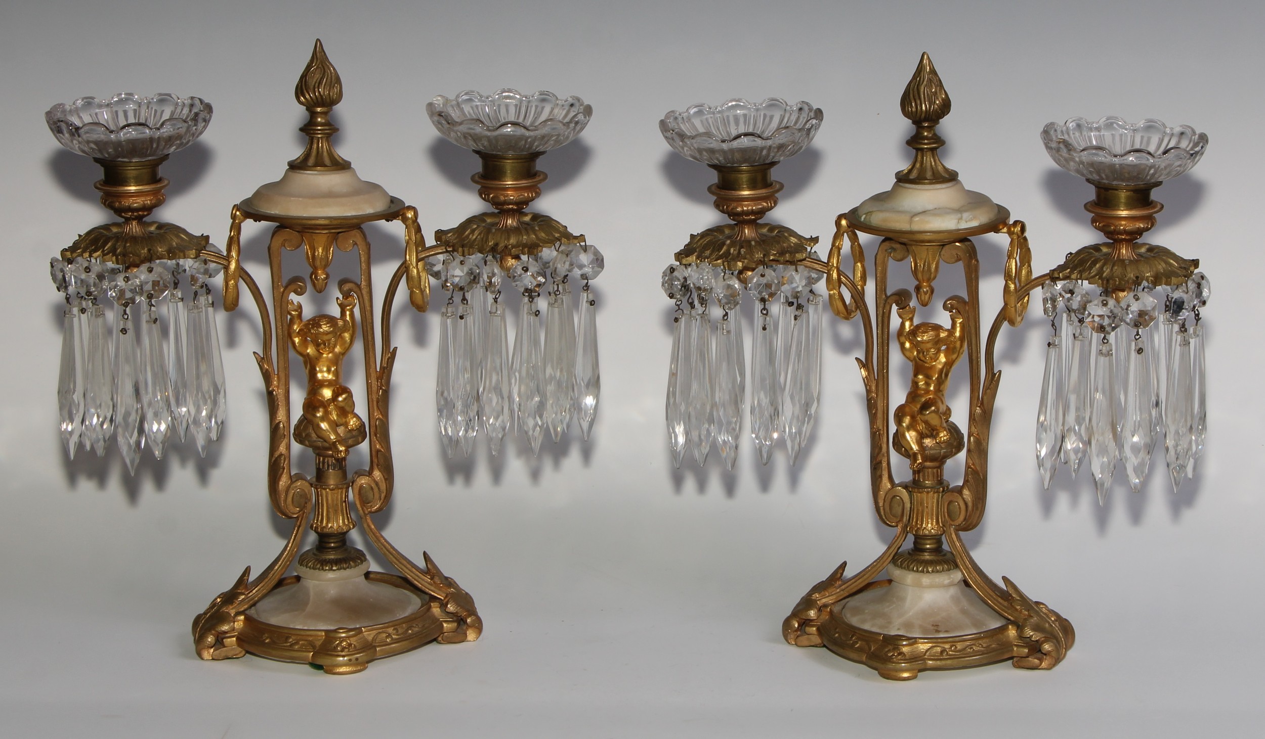 A pair of 19th century French gilt metal and alabaster two-light mantel candle lustres, each centred - Image 2 of 10