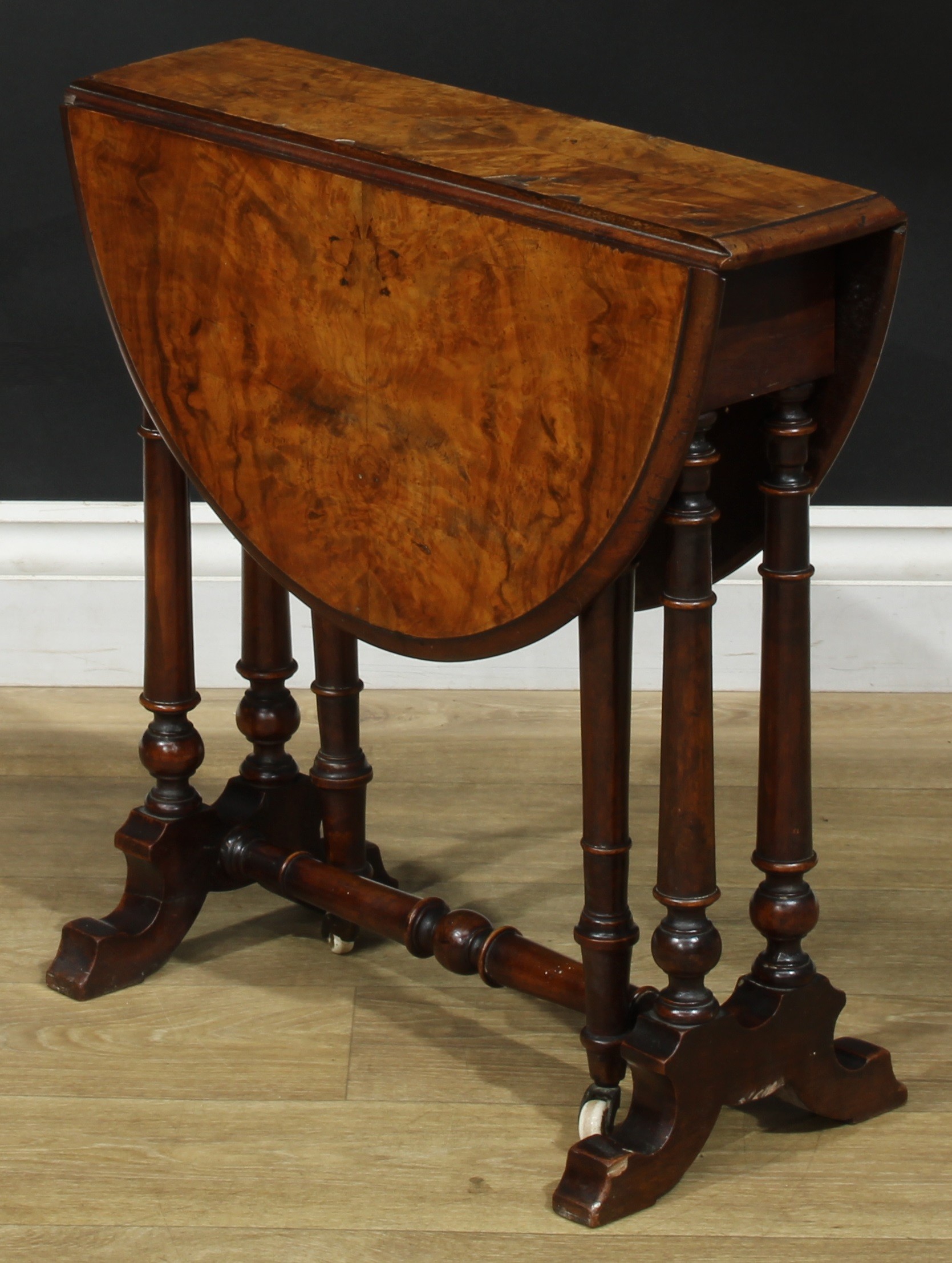 A Victorian walnut Sutherland table, of small proportions, oval top with fall leaves, turned - Image 4 of 5