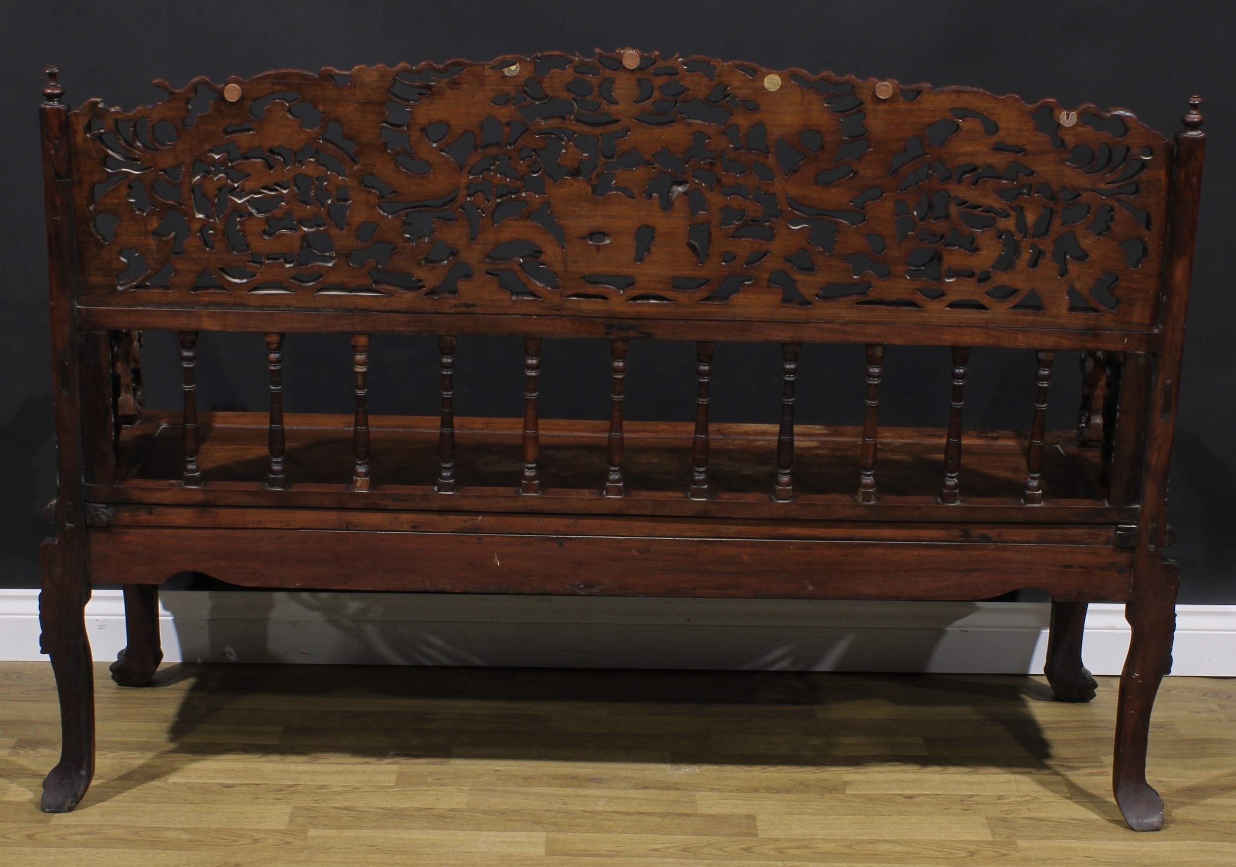 A Chinese hardwood bench or settle, arched cresting pierced and profusely carved with dragons, - Image 4 of 4