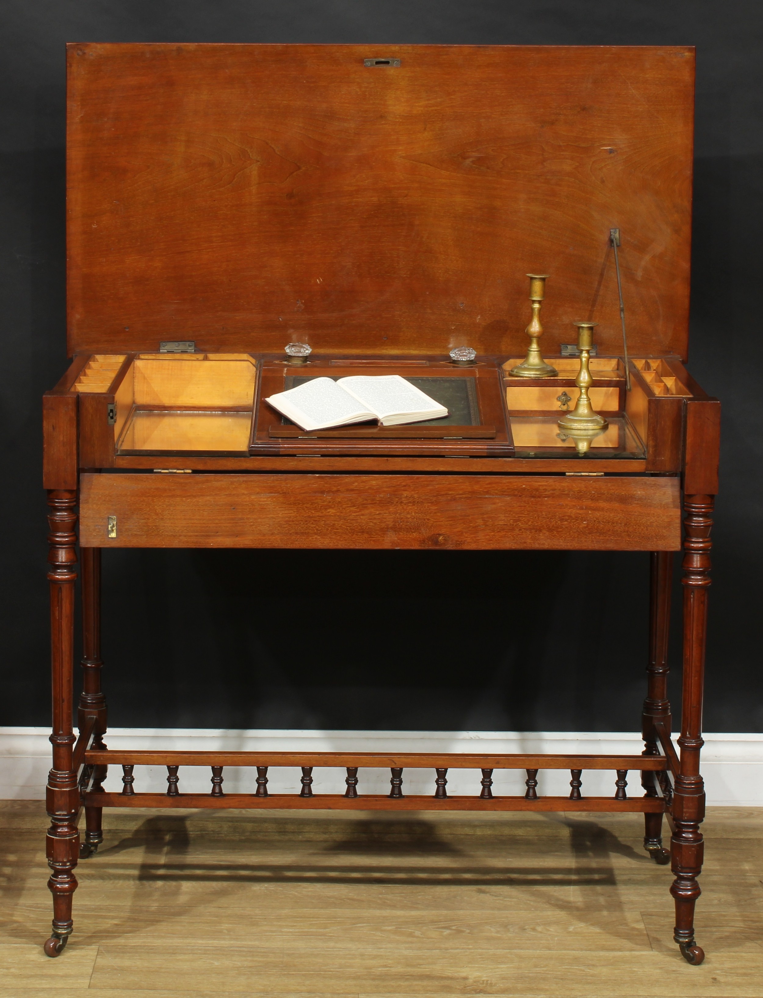 A late 19th century mahogany chamber writing table or desk, hinged rectangular top and fall front