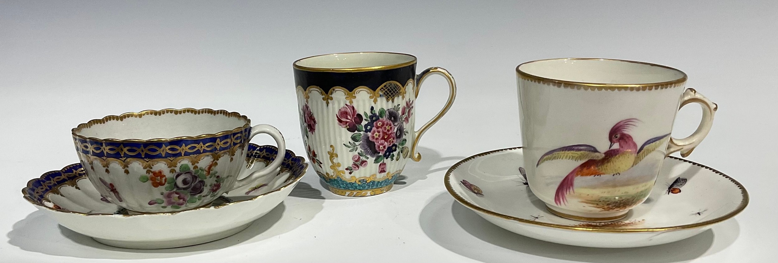 A Worcester fluted teacup and saucer, circular cartouches painted with lakeside scenes, edged with a - Image 2 of 11