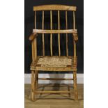 A 19th century Irish beech and ash hedge or famine chair, of traditional vernacular form, 96cm high,